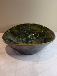 Oval åkande skål