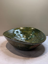 Oval åkande skål