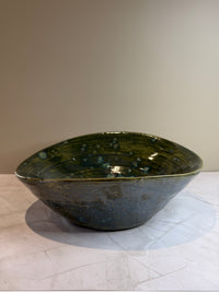 Oval åkande skål